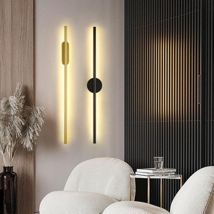 Modern wall sconces in a stylish interior setting with neutral tones.