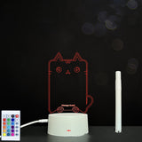 Cat-shaped night light with remote control on a dark background
