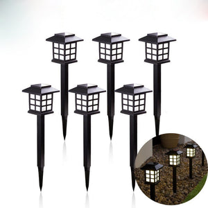 Set of six solar garden lights on a white background with an inset showing their use in a garden setting.