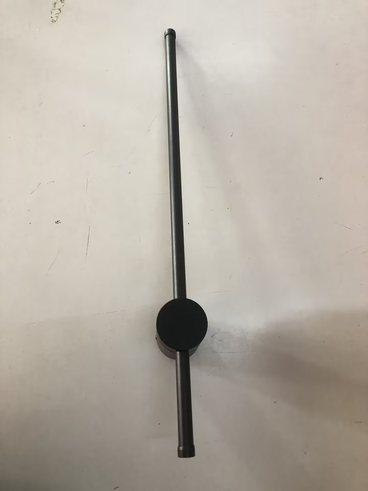 Black cylindrical object on a white background