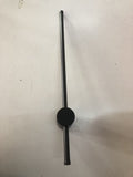 Black cylindrical object on a white background