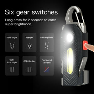 Black multi-tool with LED light and carabiner feature on a white background