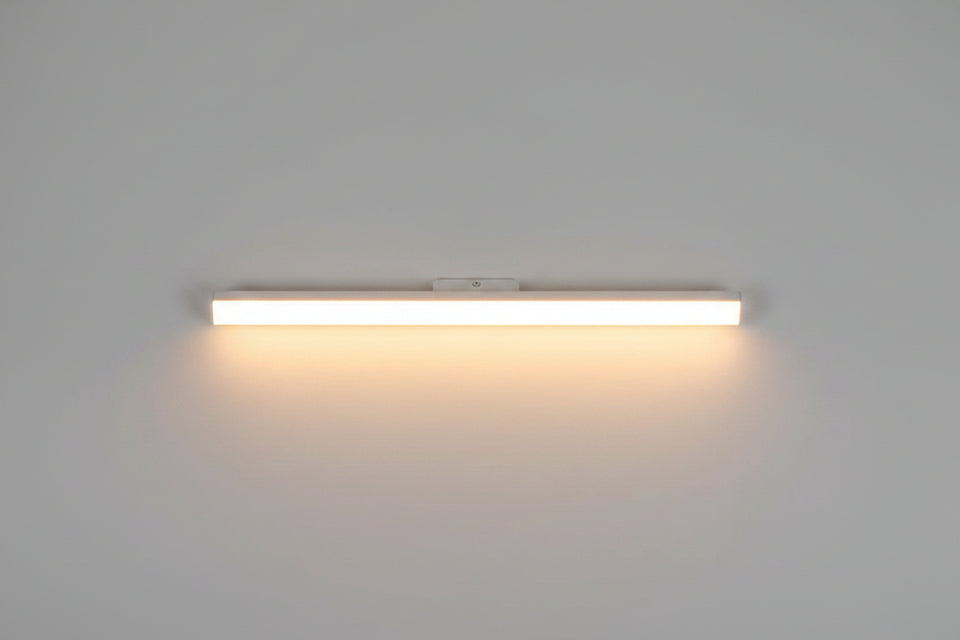 Light strip on a textured wall with a wooden floor below